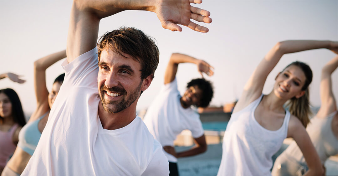 Group of people exercising outdoors